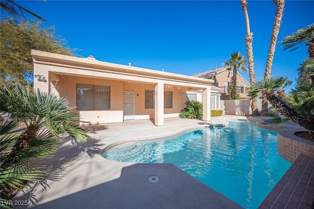 view of swimming pool featuring a patio