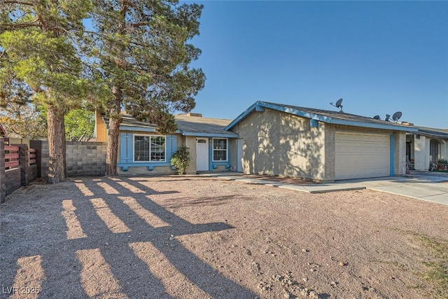 ranch-style house with a garage