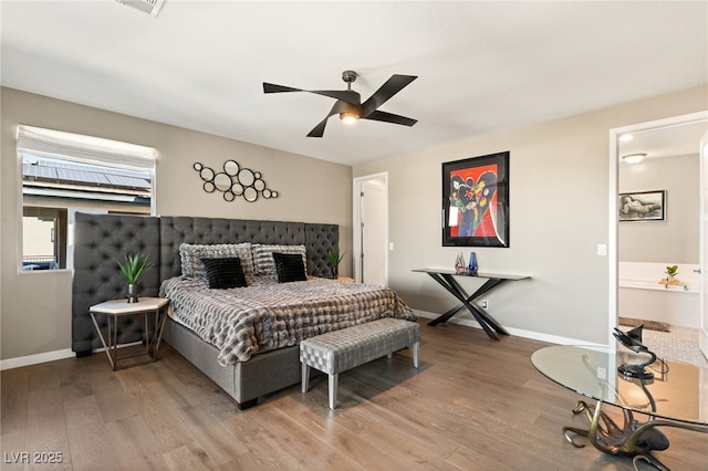 bedroom with hardwood / wood-style flooring and ceiling fan