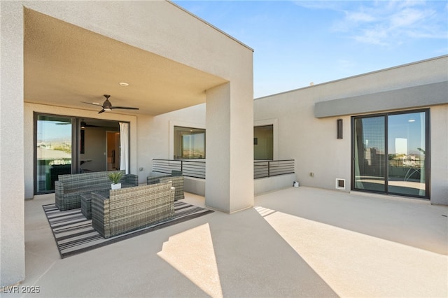 view of patio featuring an outdoor hangout area and ceiling fan