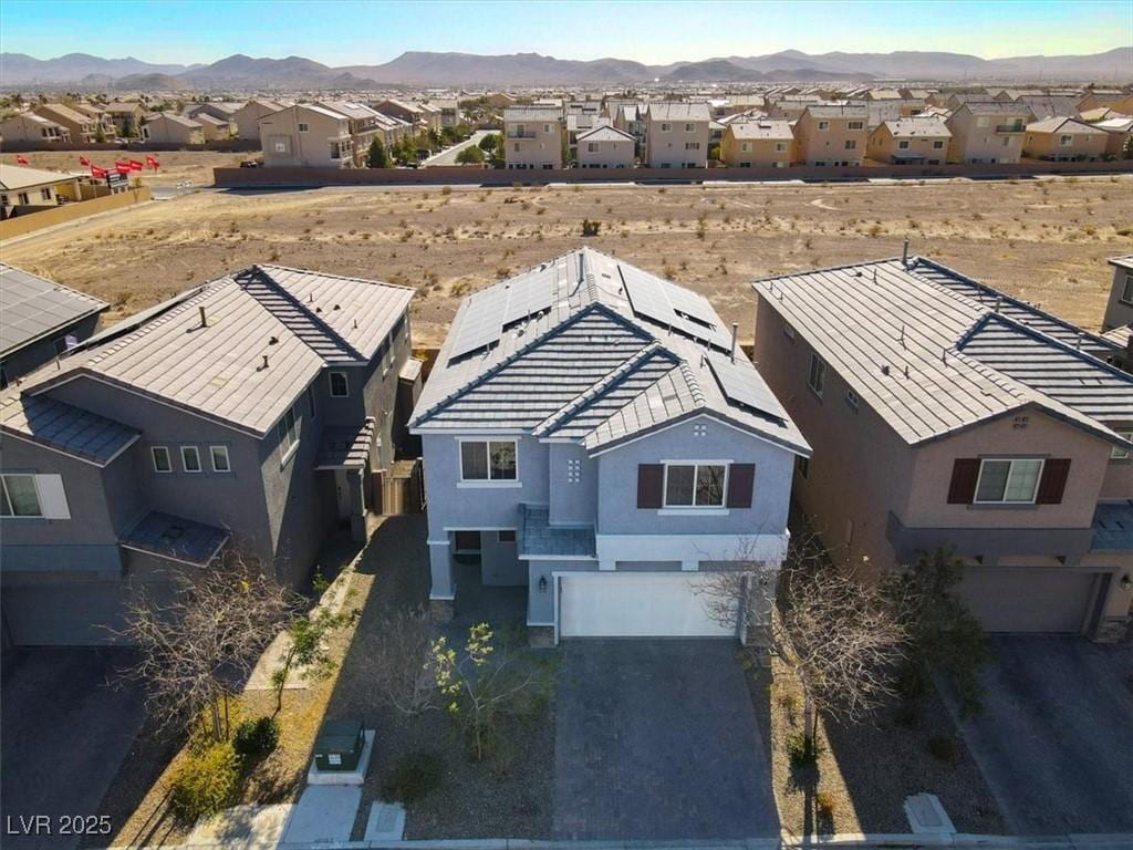 drone / aerial view featuring a mountain view