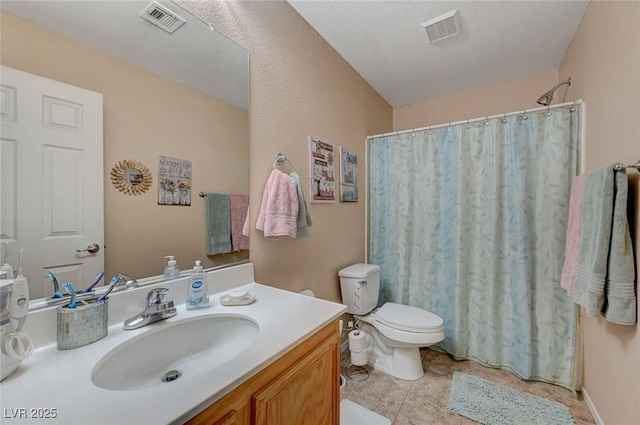 bathroom featuring vanity, a textured ceiling, curtained shower, tile patterned floors, and toilet