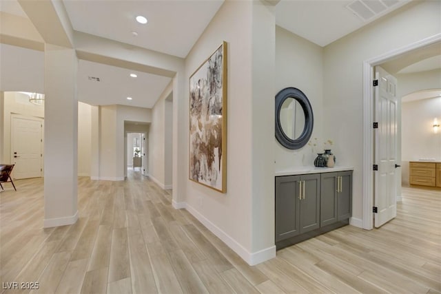 hallway with light wood-type flooring