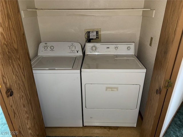 washroom with washer and dryer