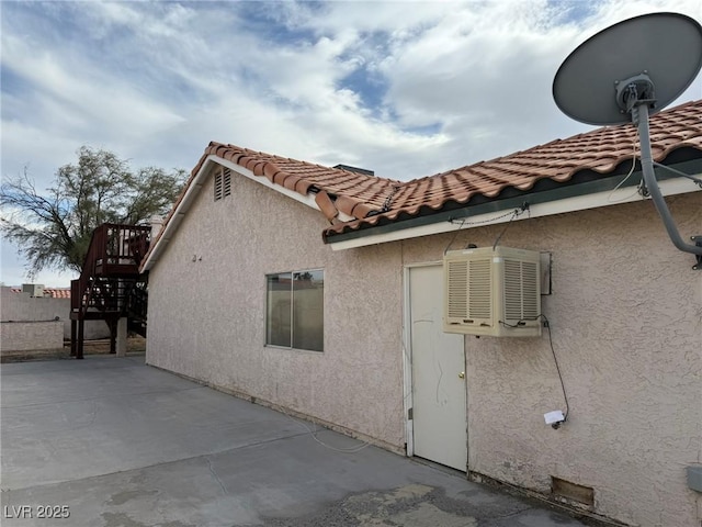 view of home's exterior with a patio area