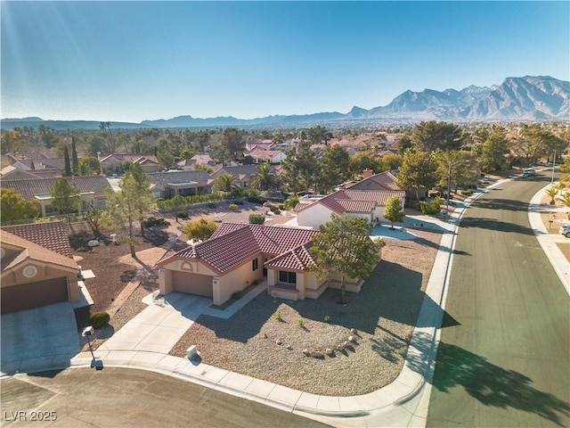 drone / aerial view featuring a mountain view