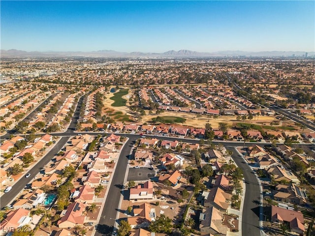 drone / aerial view featuring a mountain view