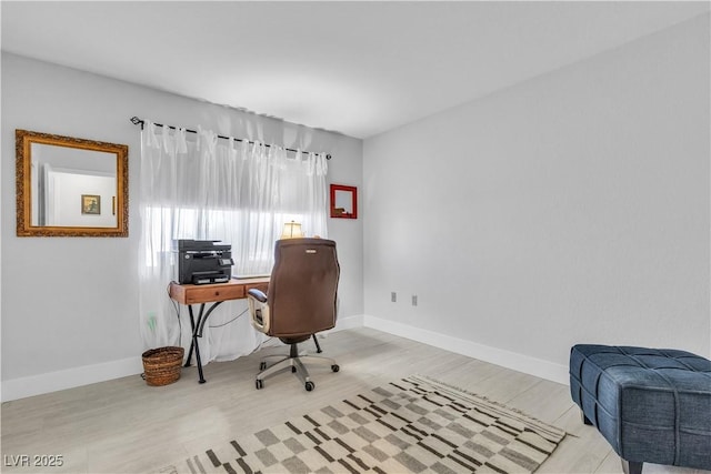 office space featuring light wood-type flooring