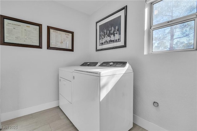 laundry room featuring washer and clothes dryer