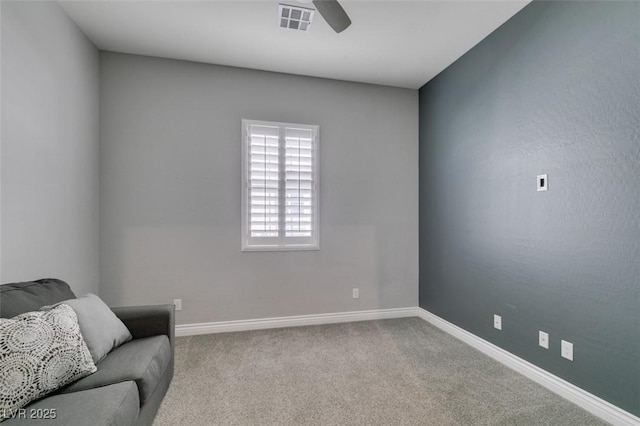 sitting room with light carpet and ceiling fan