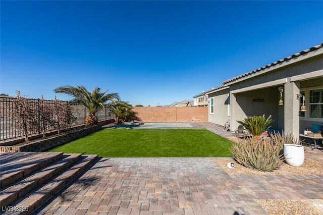 view of yard with a patio area