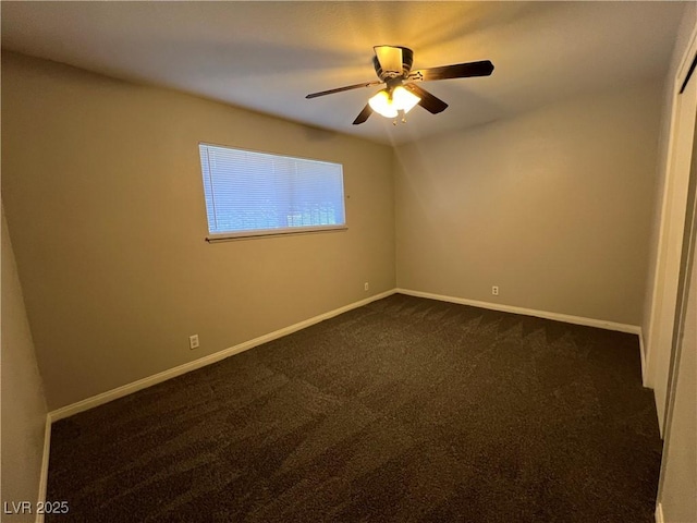 carpeted empty room with ceiling fan