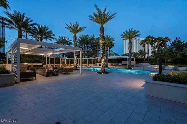 view of pool with an outdoor hangout area and a patio