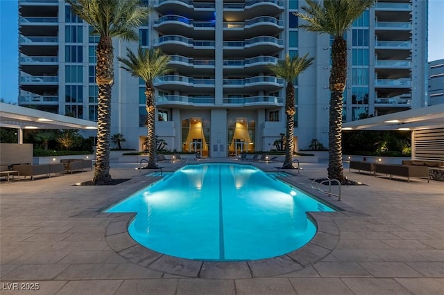 view of pool featuring a patio area