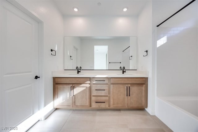 bathroom with shower / bathtub combination, vanity, and tile patterned floors