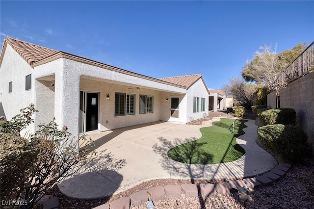 rear view of property with a patio