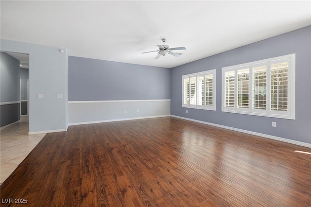 spare room featuring ceiling fan and light hardwood / wood-style floors