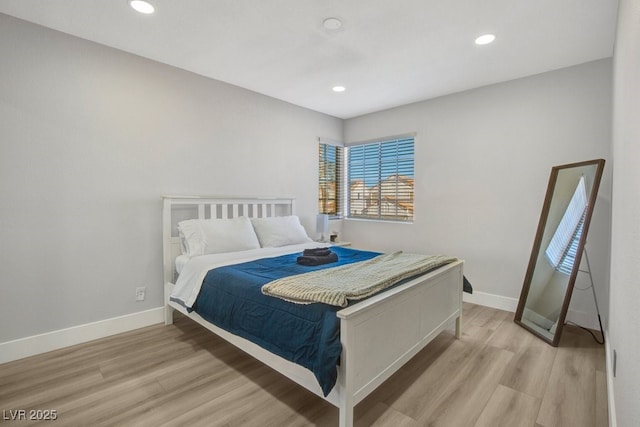 bedroom featuring light wood-type flooring