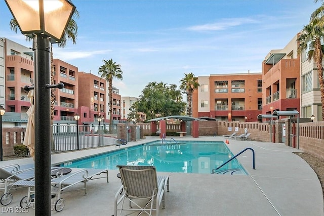 view of swimming pool with a patio