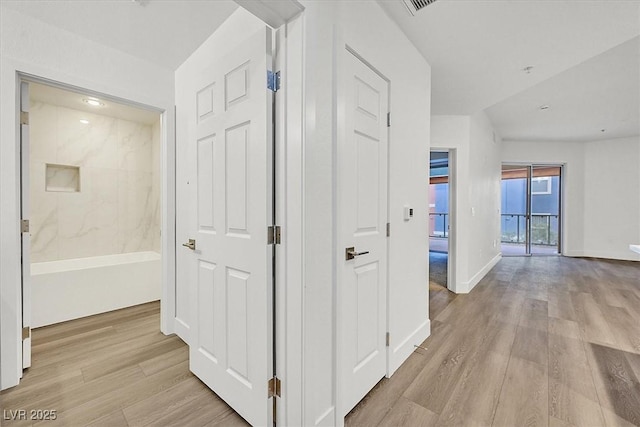 hall featuring light wood-type flooring