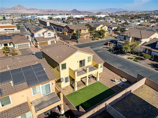 birds eye view of property featuring a mountain view