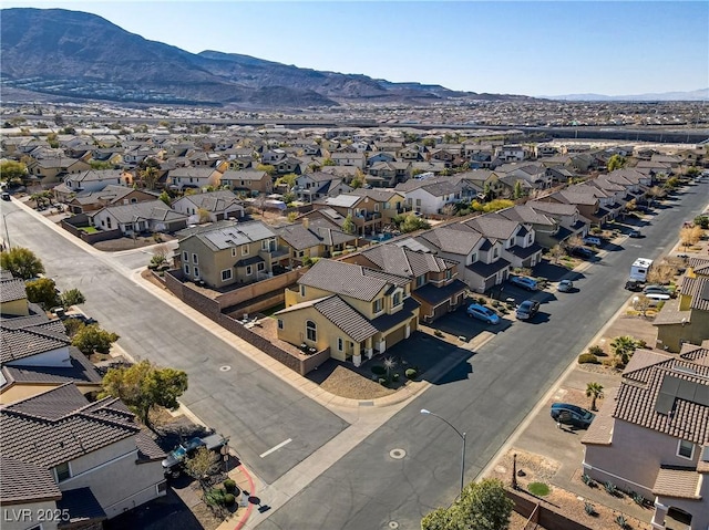 bird's eye view with a mountain view