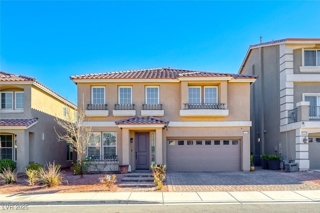 view of front of home with a garage