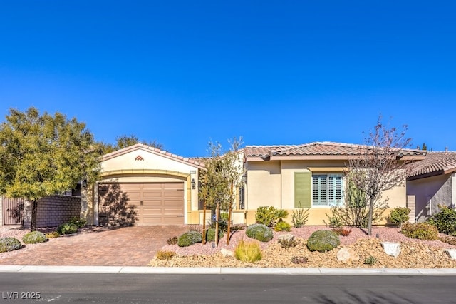 view of front of property with a garage