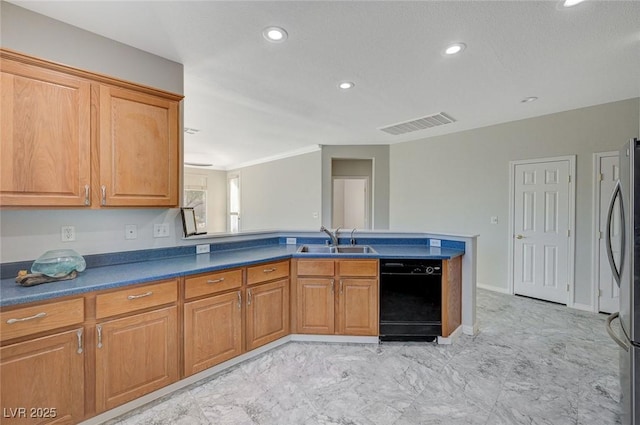 kitchen with stainless steel refrigerator, black dishwasher, and sink