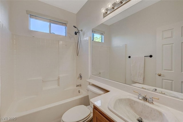 full bathroom with vanity, toilet, and  shower combination