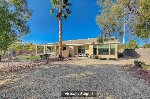 view of front of home with a pergola