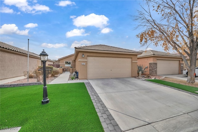 view of front of house featuring a garage, a front lawn, a tile roof, and stucco siding