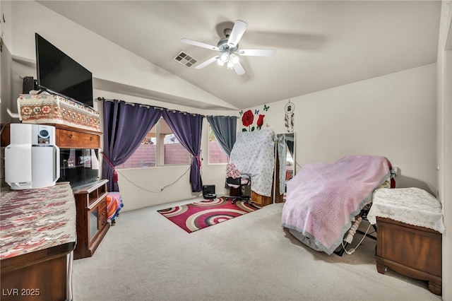 carpeted bedroom featuring lofted ceiling and ceiling fan