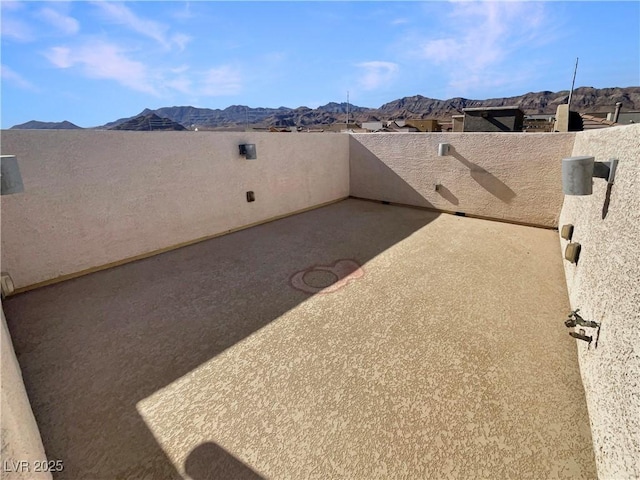 view of yard with a patio area and a mountain view