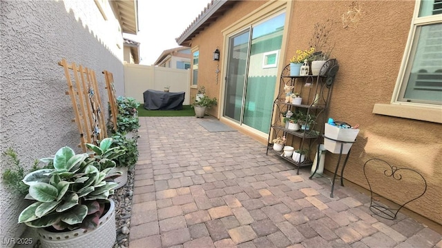 view of patio with fence