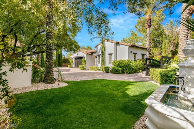 view of yard with a garage