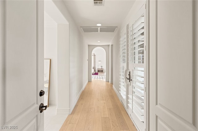 hallway featuring light wood-type flooring