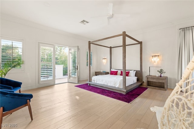 bedroom with ornamental molding, access to exterior, ceiling fan, and light hardwood / wood-style floors