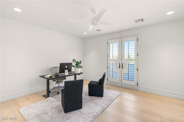 office area with light hardwood / wood-style floors, french doors, and ceiling fan