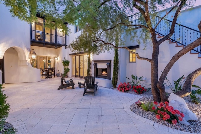 view of patio with a balcony