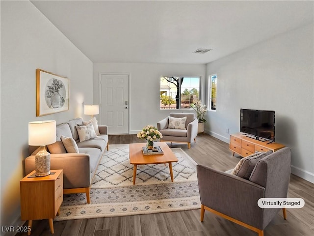 living room with hardwood / wood-style flooring