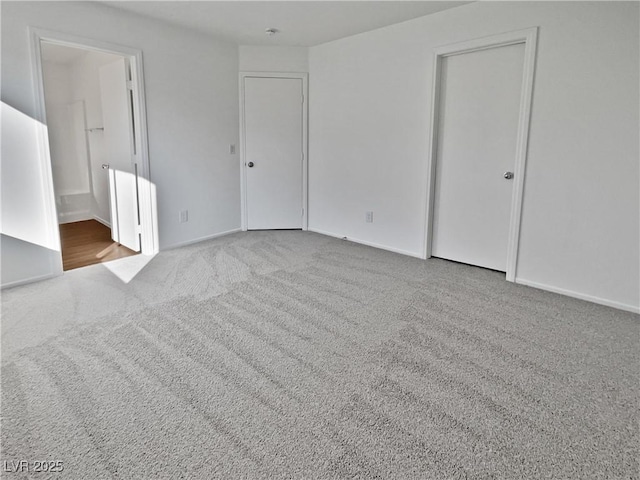 spare room featuring carpet flooring