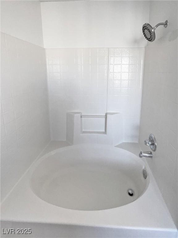 bathroom featuring shower / washtub combination