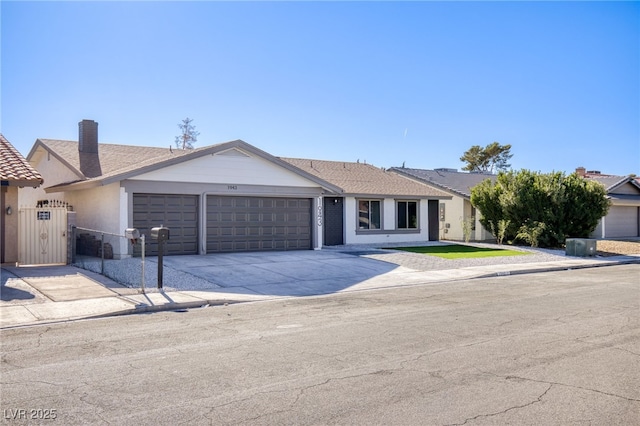 single story home with a garage