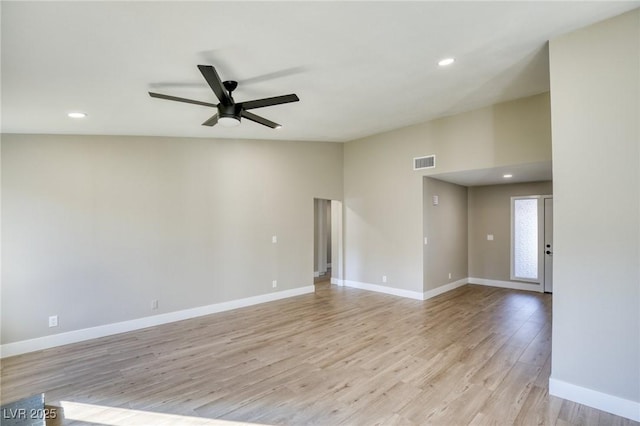 unfurnished room with light hardwood / wood-style floors and ceiling fan