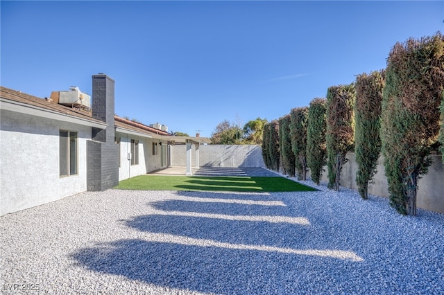 view of yard with a patio area