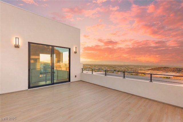 balcony at dusk with a water view