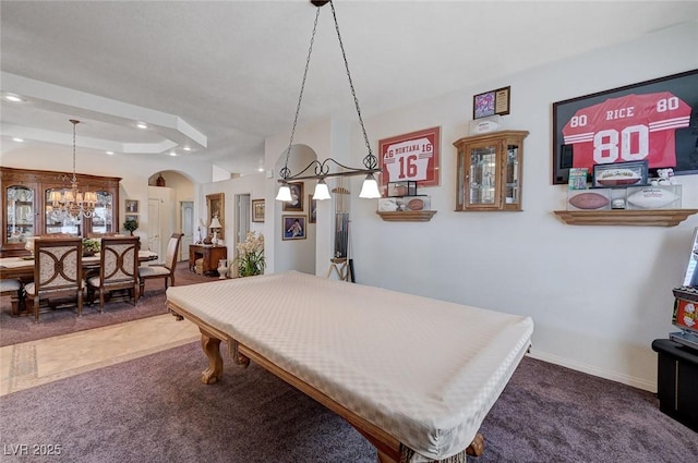 playroom featuring a chandelier