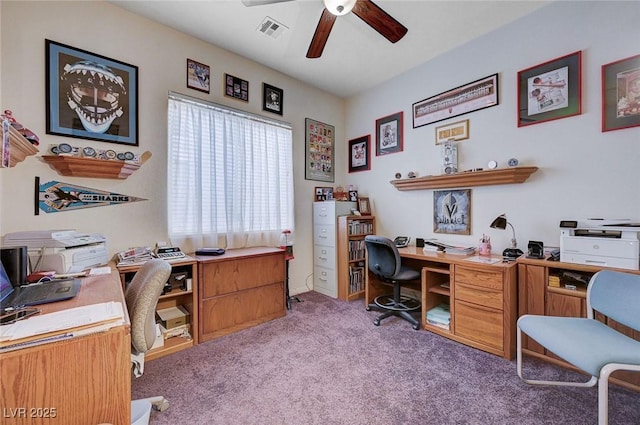 carpeted office with ceiling fan