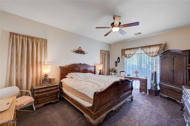 carpeted bedroom with ceiling fan